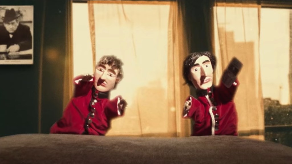 Pete and Carl developing a taste for sausages in Bethnal Green