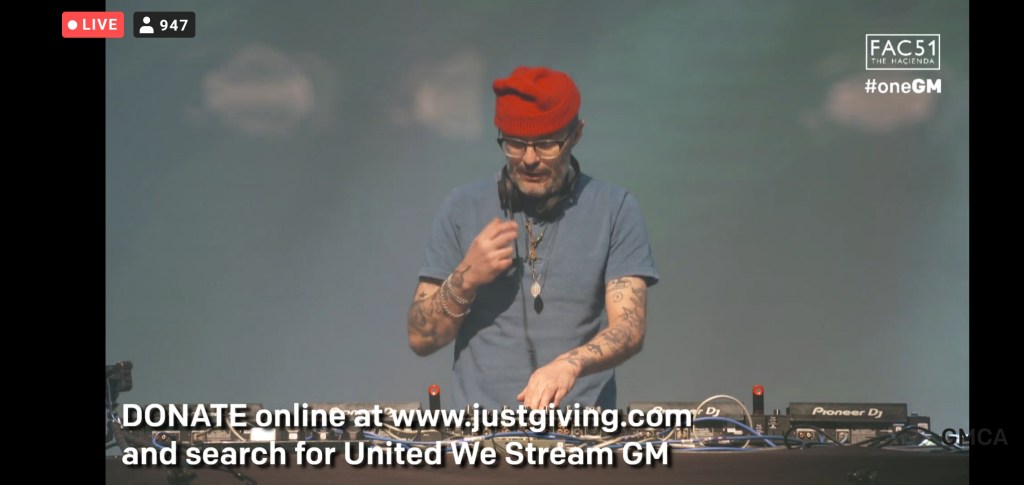 Please can someone tell me the identity of this red hat sporting DJ