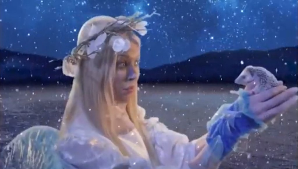 Tara Reid speaks to Andy the Talking Hedgehog in fairyland