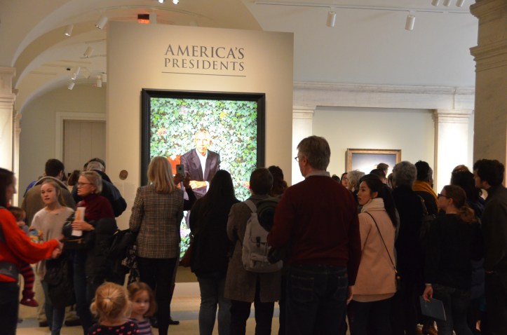 Crowds around Barack Obama painting