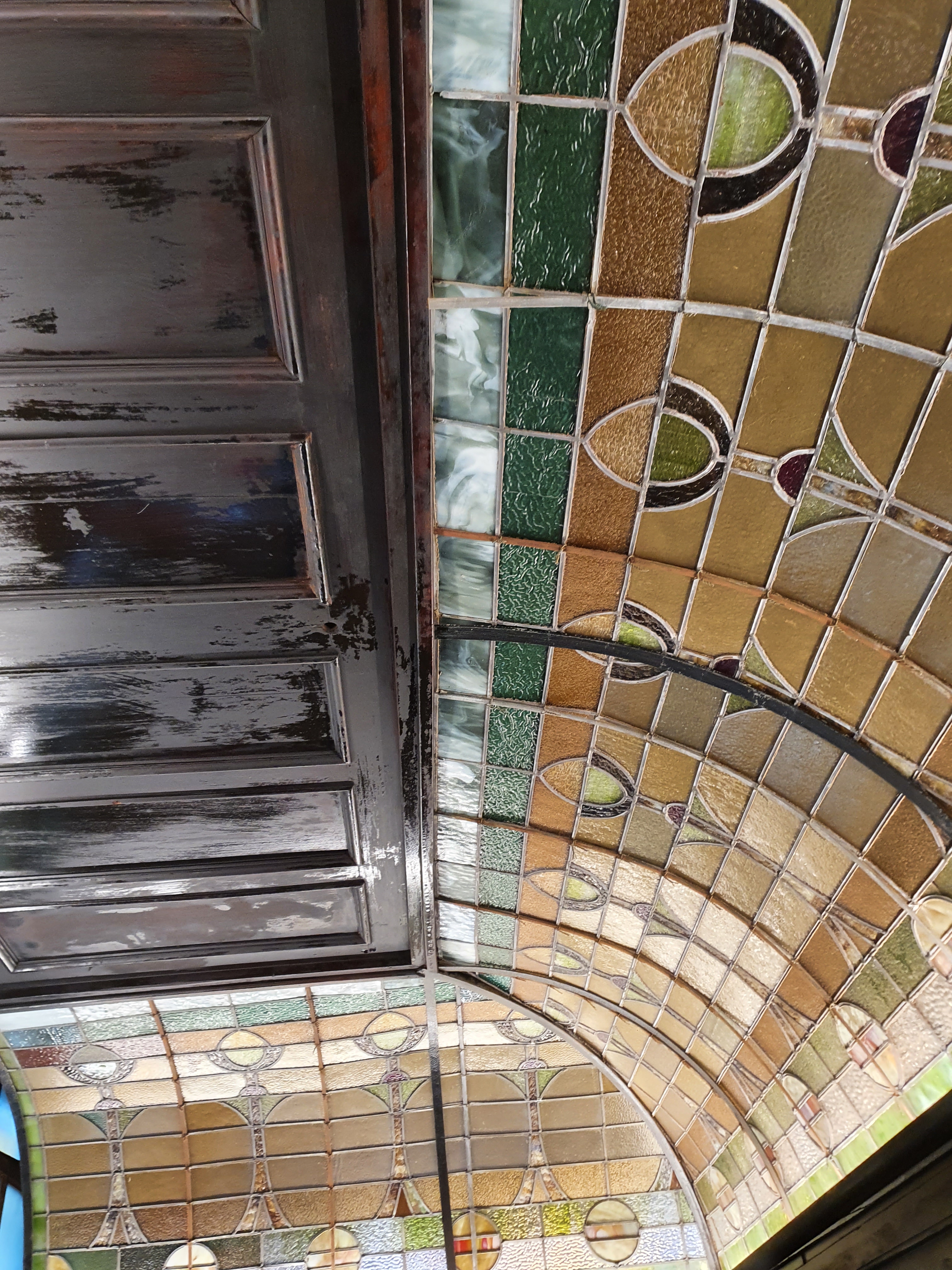 The P.J. Clarke's mens room has a lot of stained glass on the ceiling