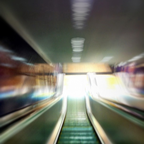 Entitled Glaswegian dream sequence the picture shows a blurry vision of going down an escalator