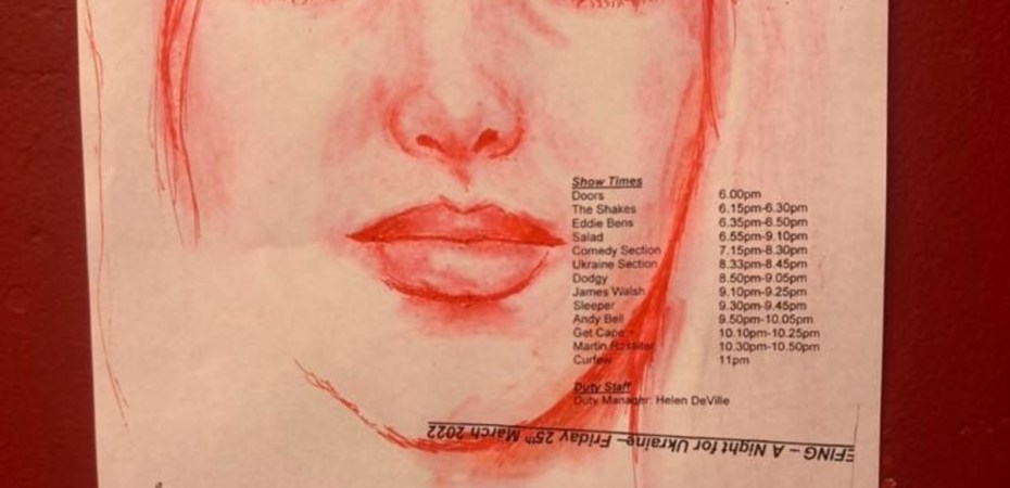 The security guard on the door to backstage did this drawing of a woman's face with a red ballpoint pen
