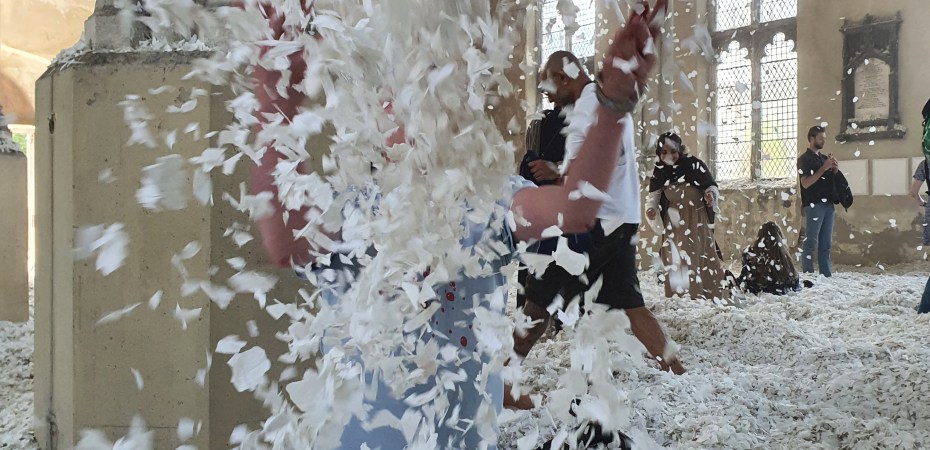 Confetti petals fill the frame as I throw them in the air