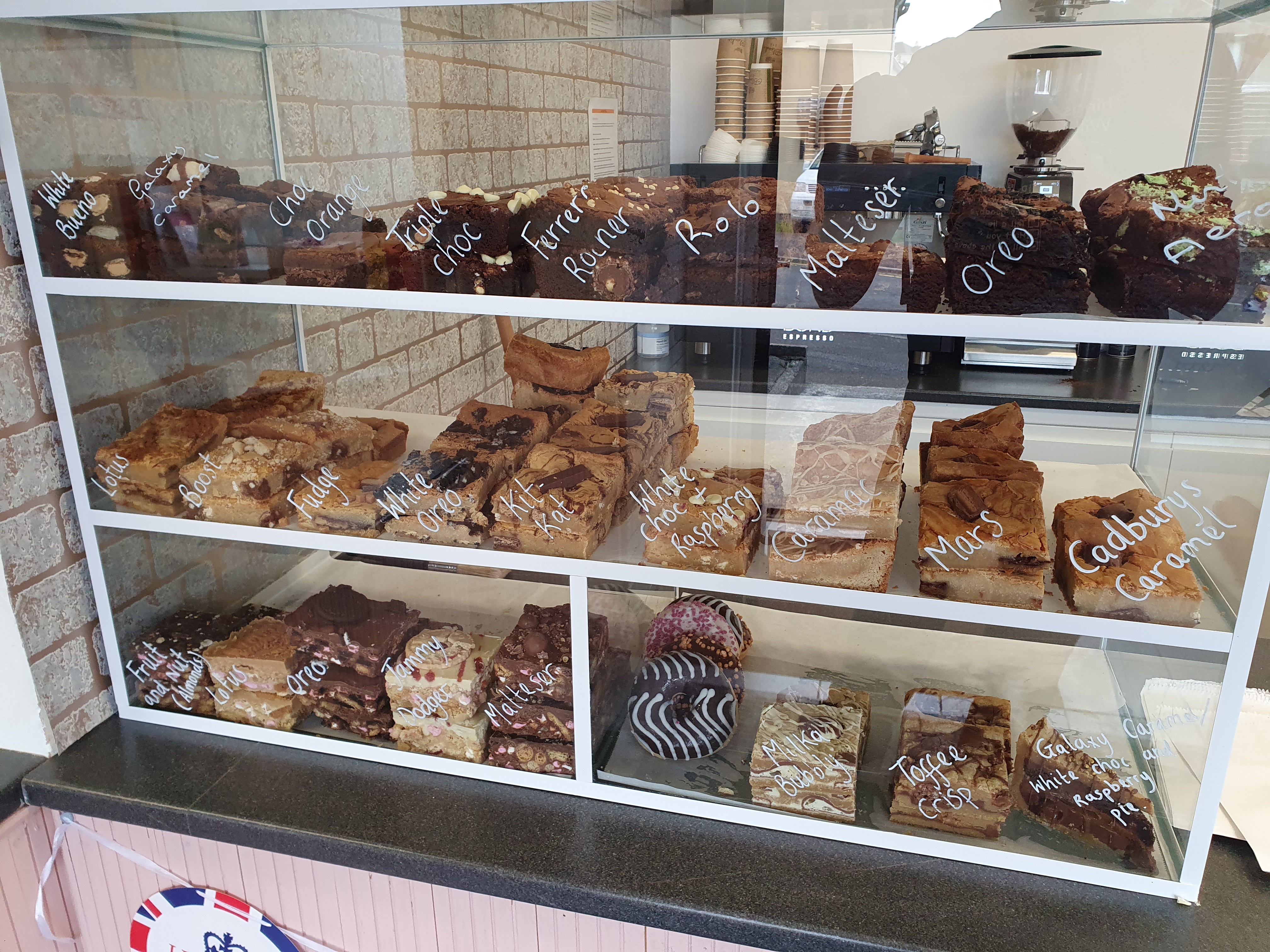A display case of blondies and brownies on sale at The Blondie Bar