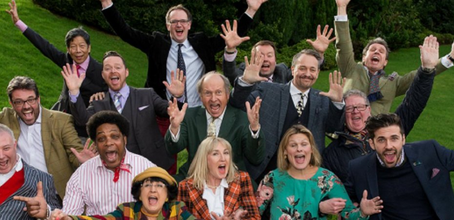 With their arms outstretched and mouths open wide ther Bargain Hunt experts appear to be having a lot of fun